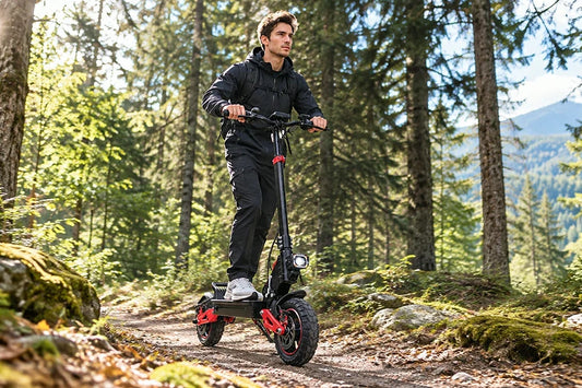 Man riding Freeboy J15 Max electric scooter on rocky forest trail.